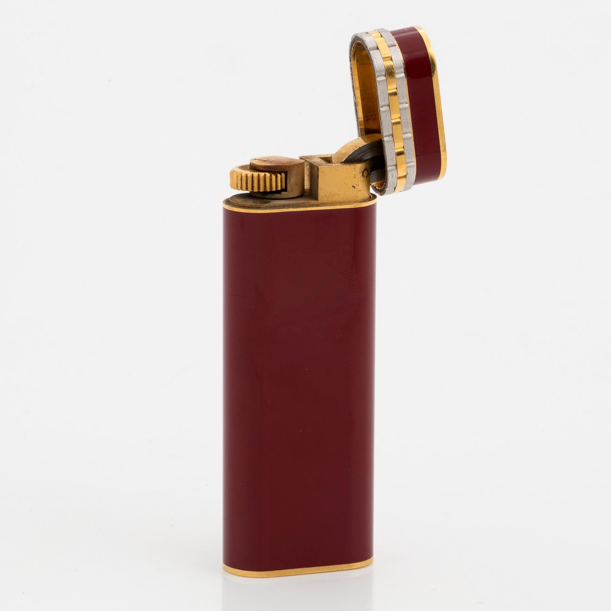 A Cartier lighter and pen.