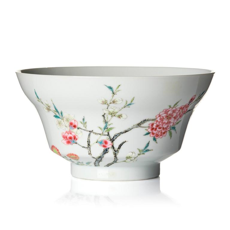 A fine famille rose ''prunus and magnolia' bowl, Qing dynasty.