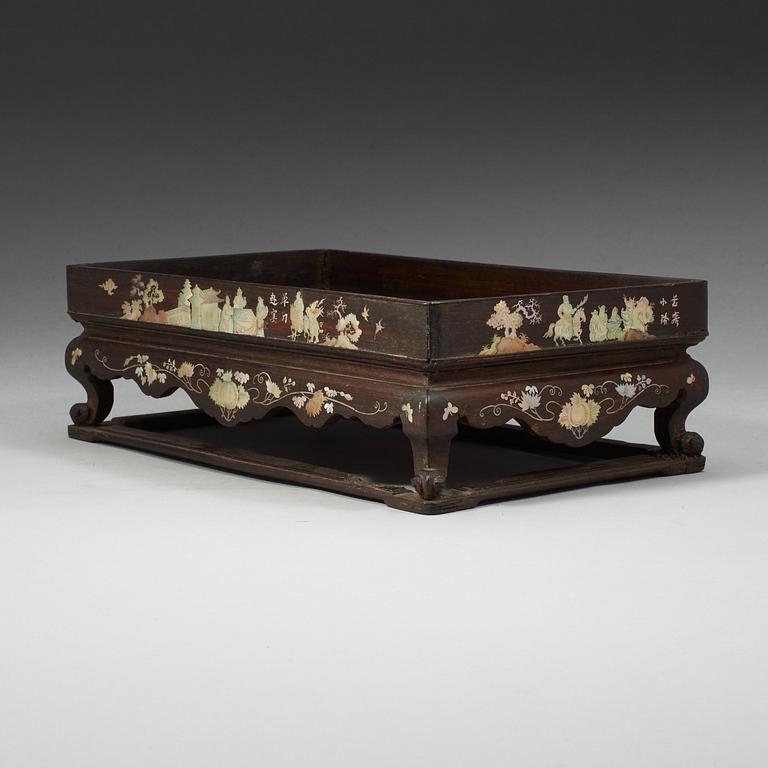 A wooden opium tray with inlays of mother-of-pearl, Qing dynasty, 19th Century.