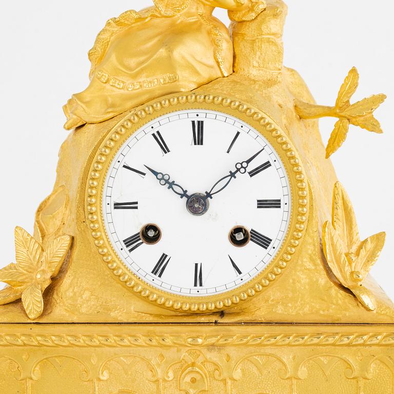 A Louis XV-style table clock, late 19th century.