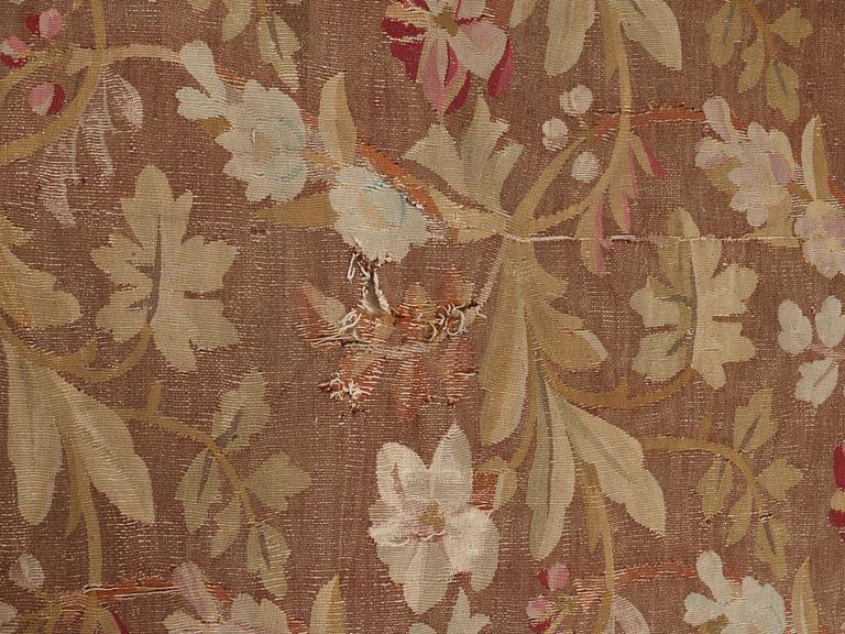 A CARPET, tapestry weave, ca 415,5-419 x 392-396 cm, Aubusson, France, the age of Louis Philippe, around 1840.
