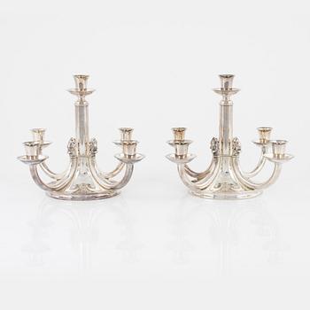 A pair of silver plated candelabra, bearing the mark of Atla, Denmark, second half of the 20th Century.