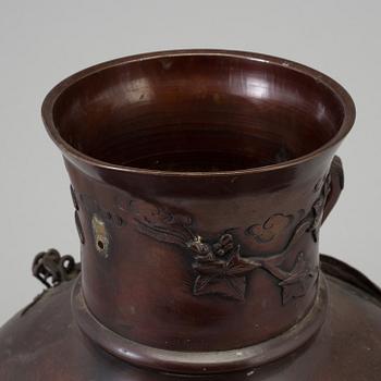 A JAPANESE BRONZE URN, Meiji 1868-1912.