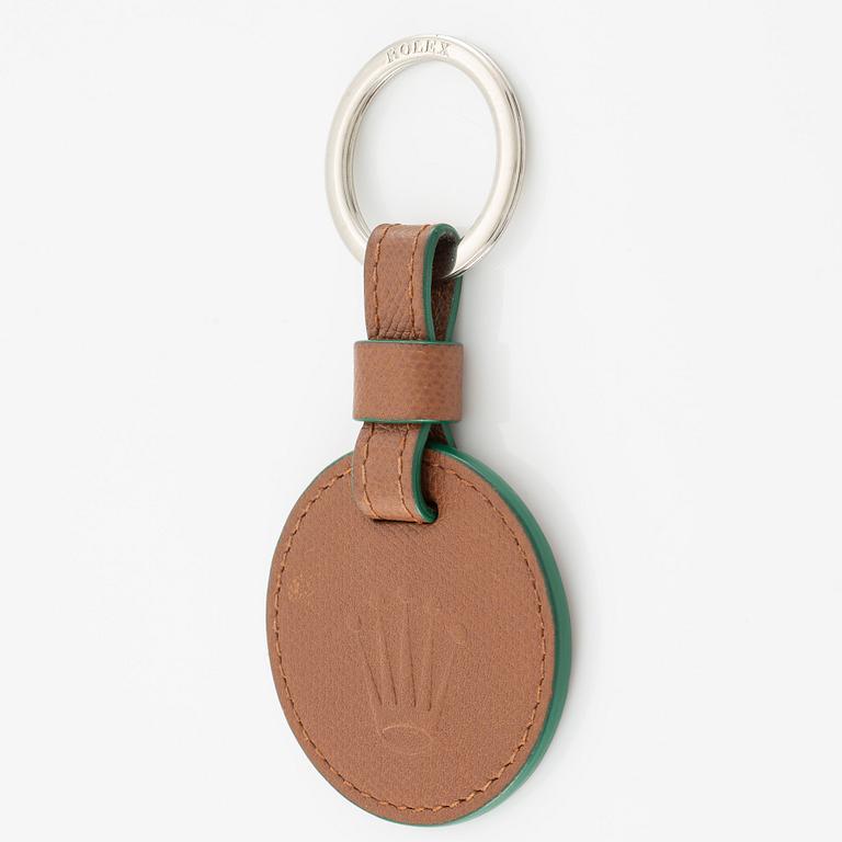 Rolex, key ring, "No Reserve", 59 x 120 mm.