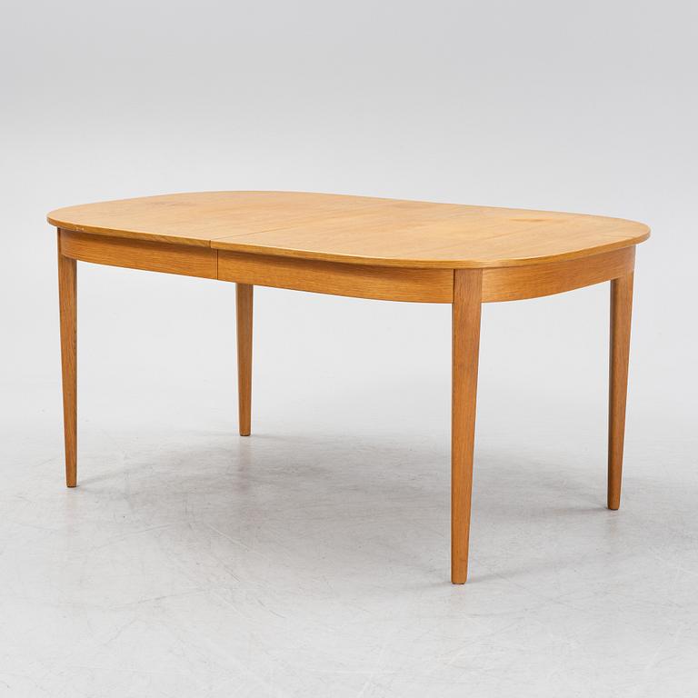 Carl Malmsten, a dining table and four chairs, 'Calmare nyckel', Åfors Möbelfabrik, second half of the 20th century.
