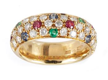 545. A ring, set with diamonds, sapphire, ruby and emeralds.