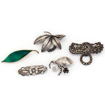 Five silver brooches including one by David Andersen, Norway.
