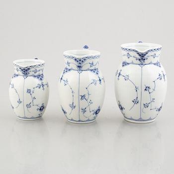 Three 'Blue Fluted Half Lace' / 'Musselmalet' porcelain jugs, Royal Copenhagen, model 562, 561, 763, 1898-1923 and 1962.