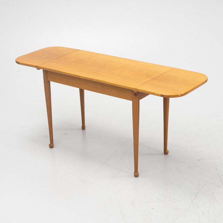 Josef Frank, a model 1007 mahogany drop leaf table, Svenskt Tenn, Sweden, second part of the 20th Century.