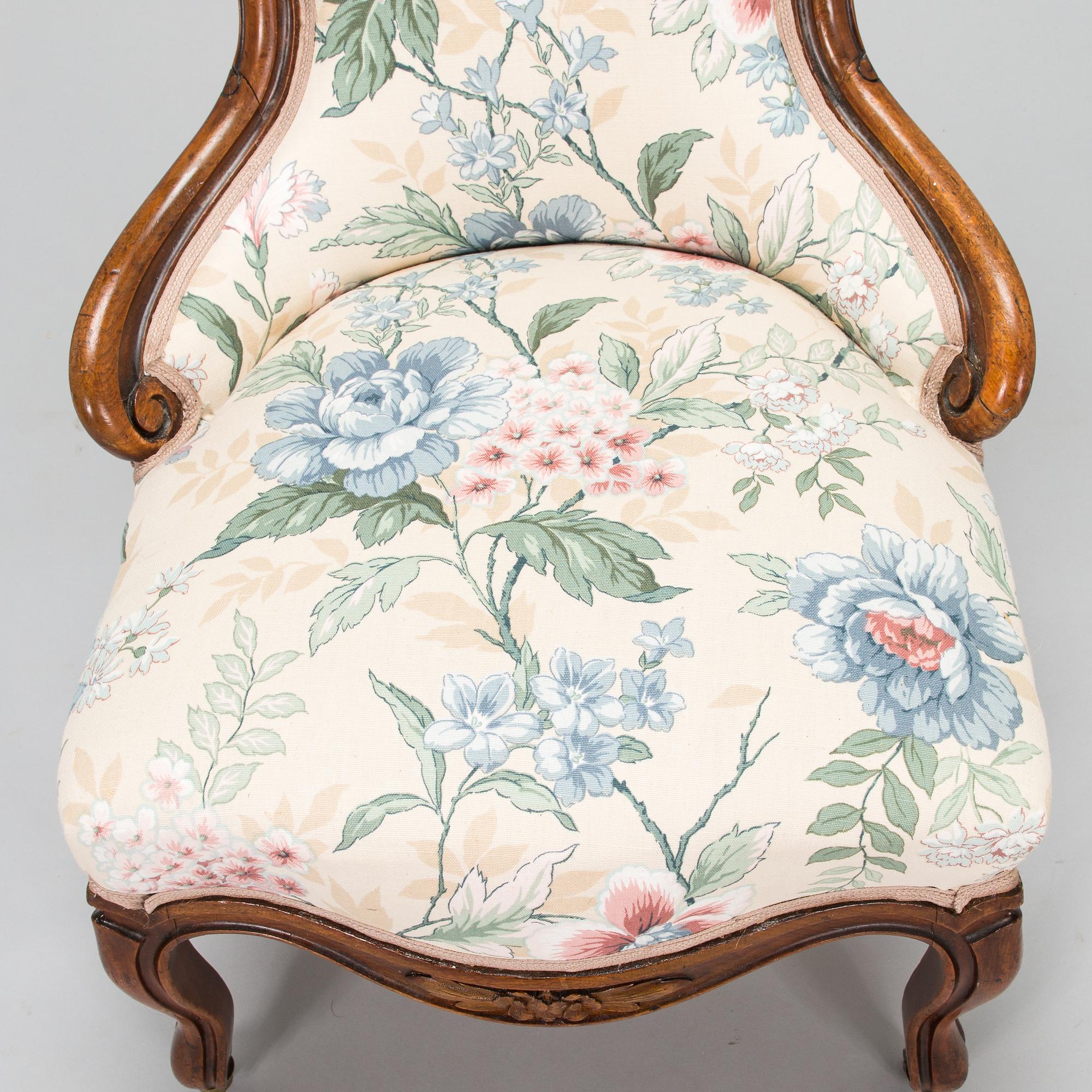 A late 19th century armchair in Rococo style.