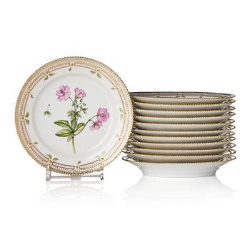 458. A set of 12 Royal Copenhagen 'Flora Danica' lunch plates, Denmark, 20th century.