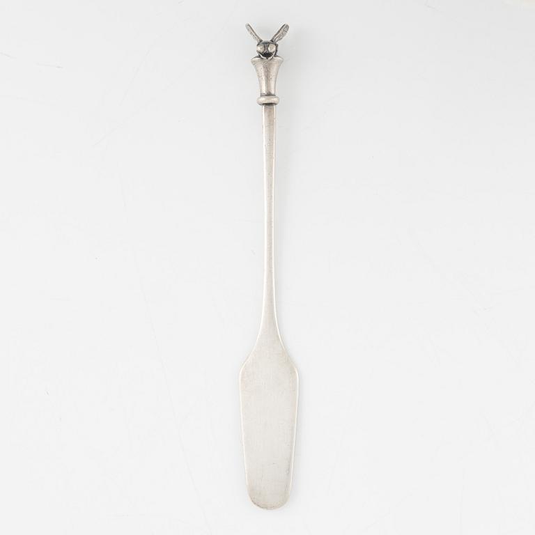 A silver honey spoon designed by Barbro Littmarck for W.A Bolin, Stockholm 1965.