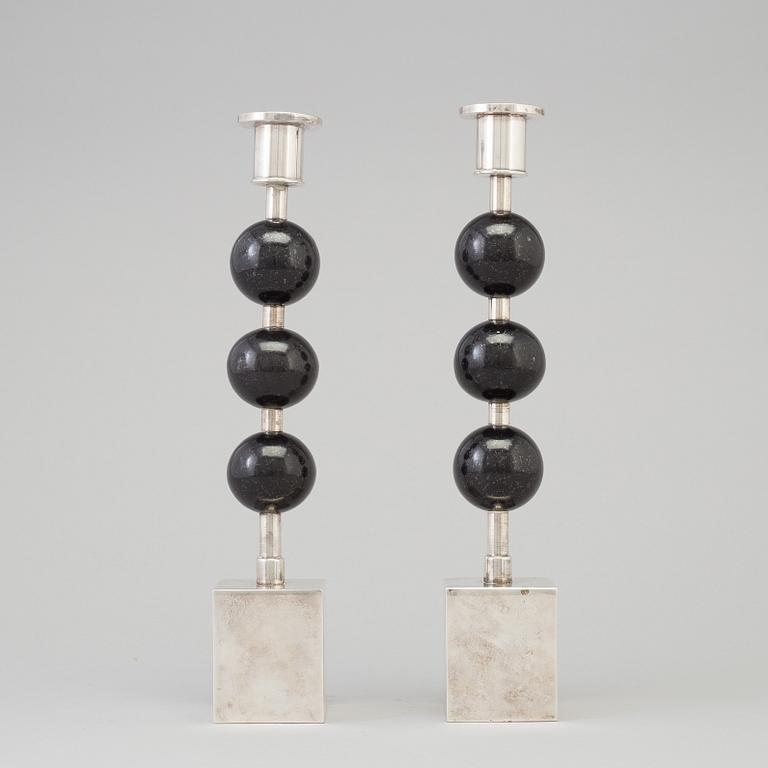 SIGURD PERSSON, a pair of silver plate and diabase candle sticks.