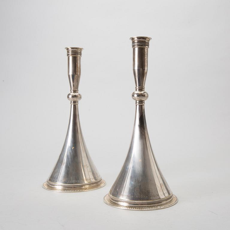 A pair of 20th century Swedish sterling silver candle sticks mark of W Nilsson Lund 1959, weight 768 gr.