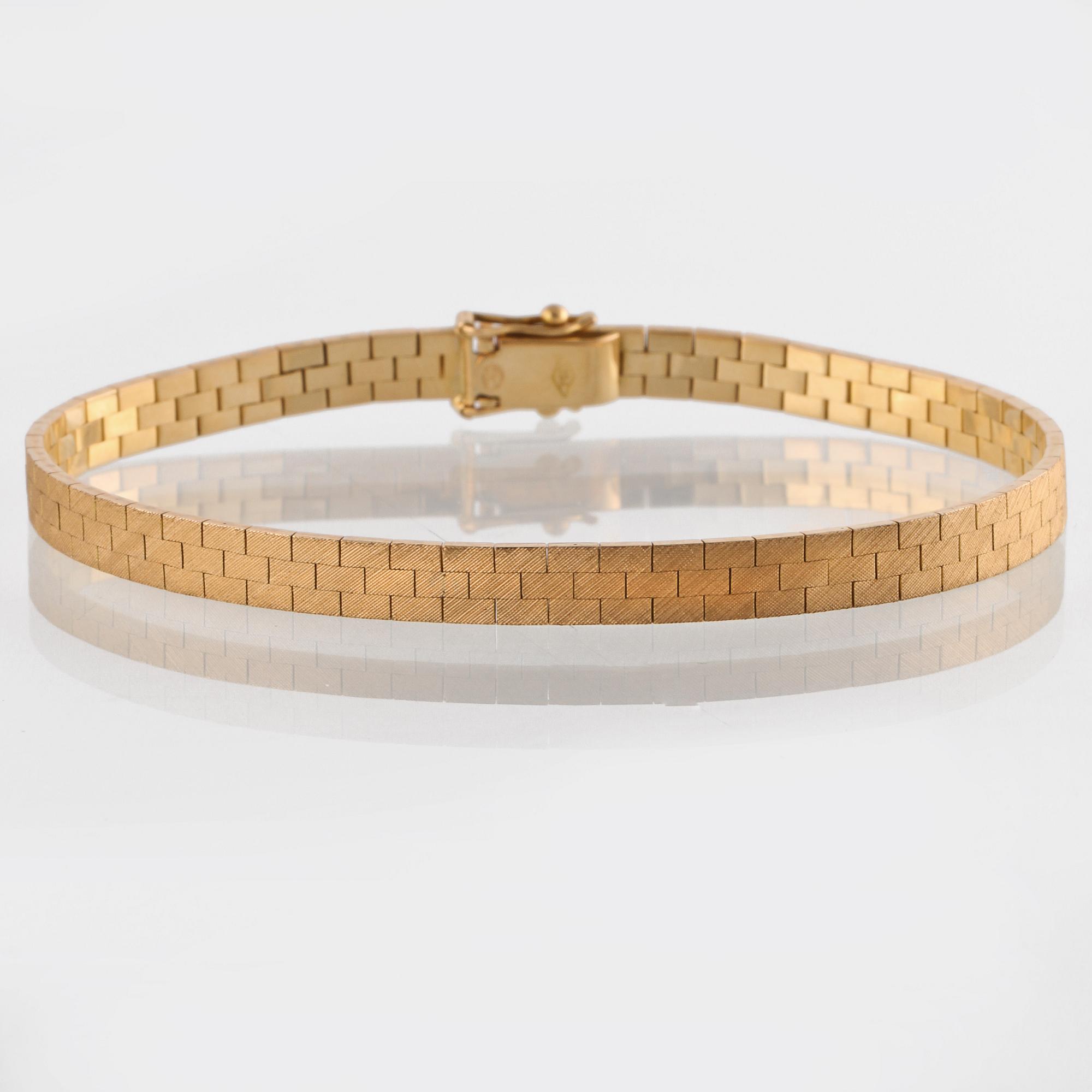 ARMLÄNK, 18K guld, importstämplad. Vikt 16,3 gram.