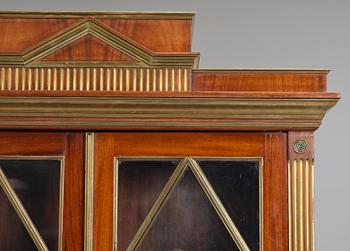 A pair of Russian mahogany and brass-mounted Jacob-style bibliothèques, modern with old parts.