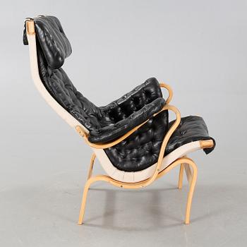 A 20th century "Pernilla" armchair, designed by Bruno Mathsson for DUX.