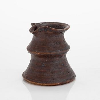Kyllikki Salmenhaara, a stoneware creamer signed KS Arabia.