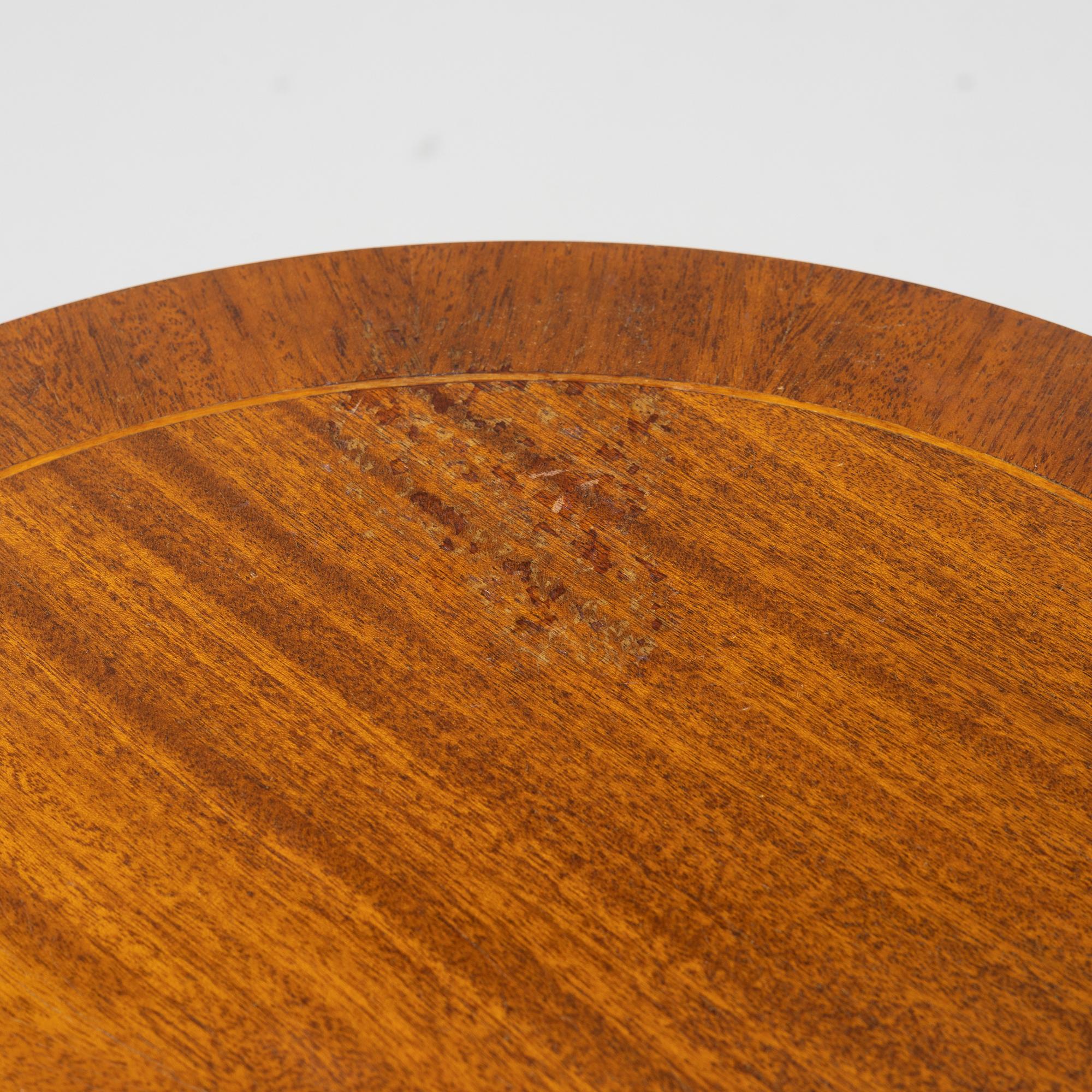 A 1940s mahogany veneered cabinet.