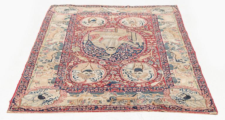 An antique pictoral Kerman Laver rug, south east Persia (Iran) c. 212 x 138 cm.