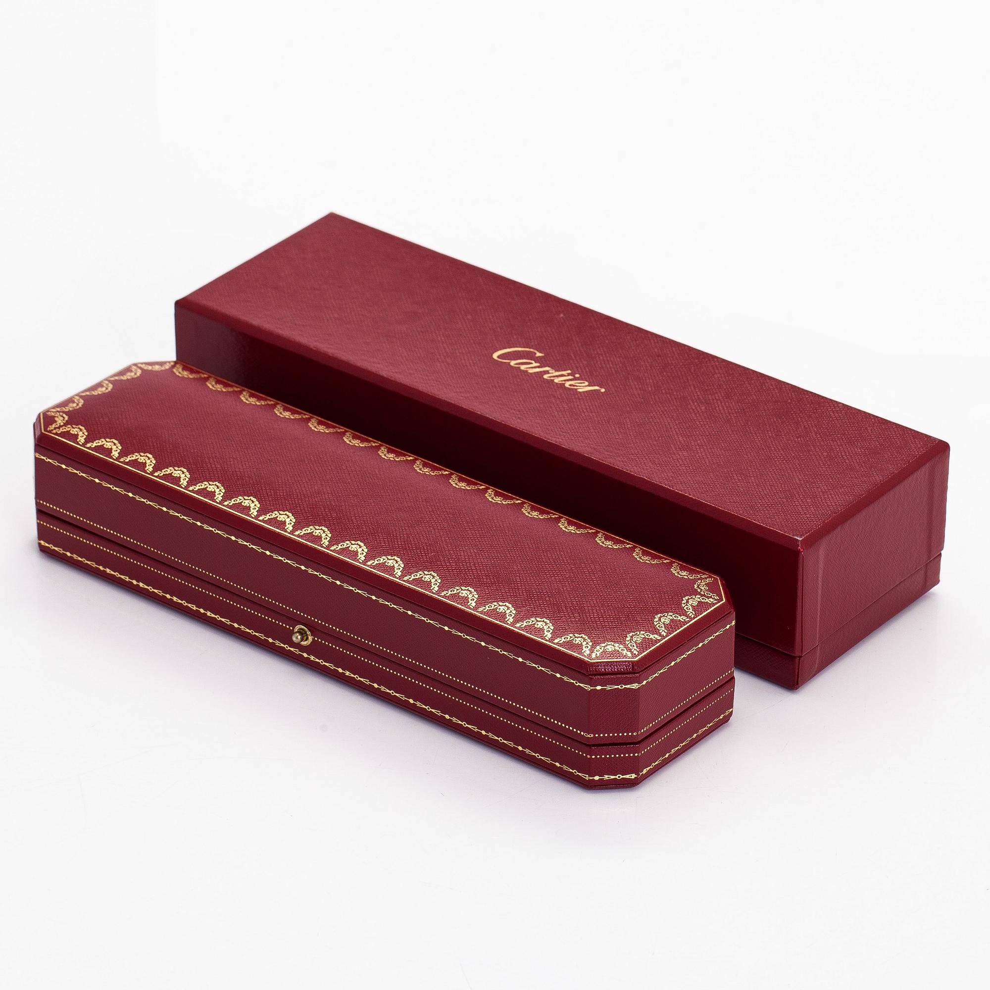 Cartier, an 18K gold "Amulette de Cartier" bracelet with malachite and a brilliant-cut diamond.