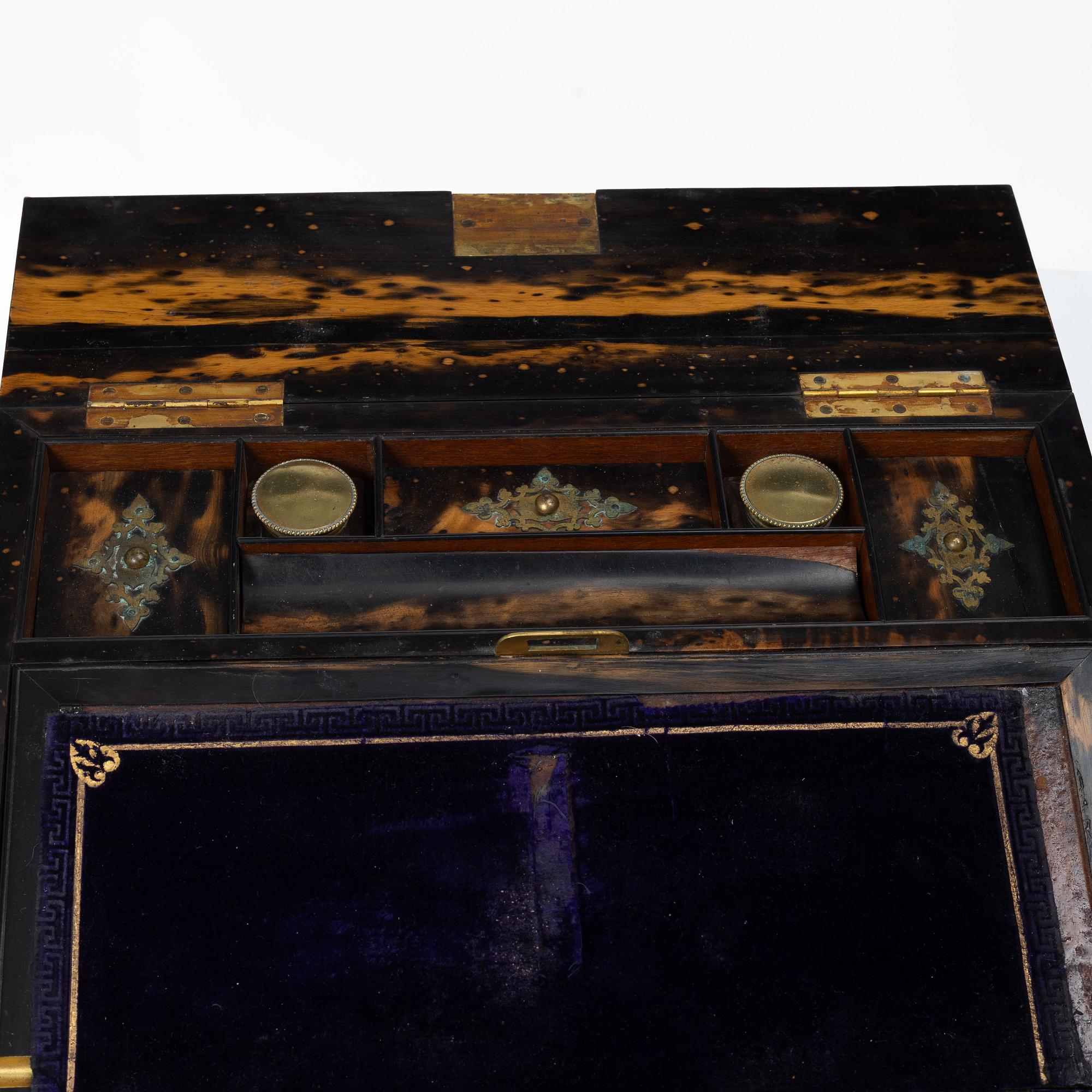 A Victorian faux-tortoise writing box by Betjemann & Sons, London.