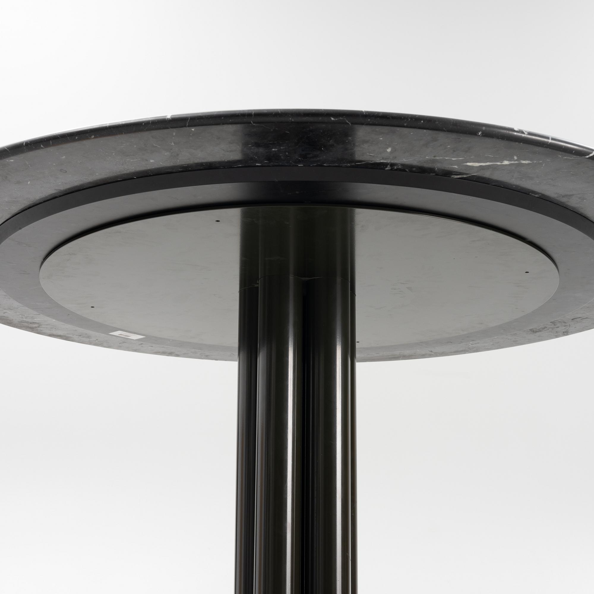 Louise Roe, a 'Roundabout' dining table with marble top.