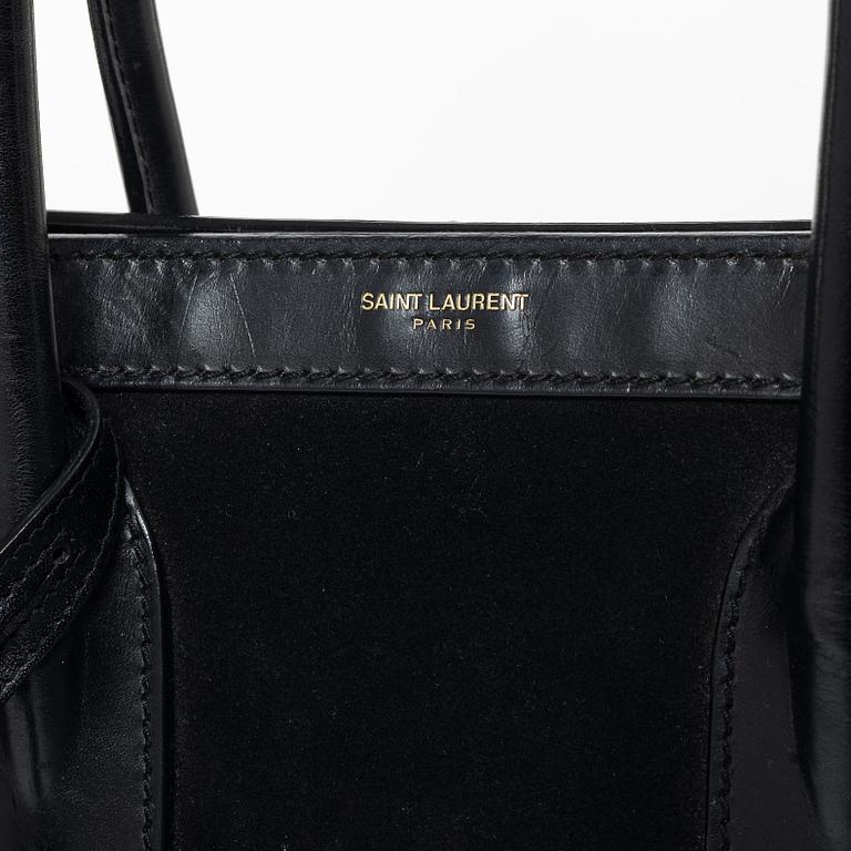 Yves Saint Laurent, a 'Sac du Jour' handbag.