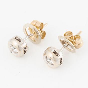 Earrings, a pair, 18K gold with brilliant-cut diamonds.