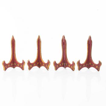 A group lot of 13 Chinese wooden stands, 20th century.