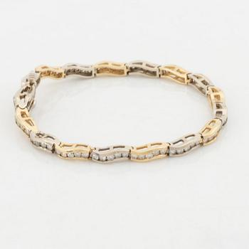 14K gold and brilliant cut diamond bracelet, with extra link.