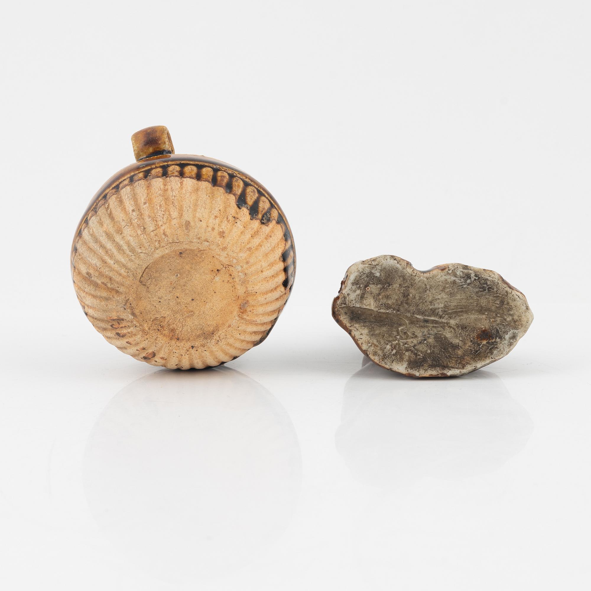 A brown glazed water dropper and a brush rest, Qing dynasty, 19th Century.