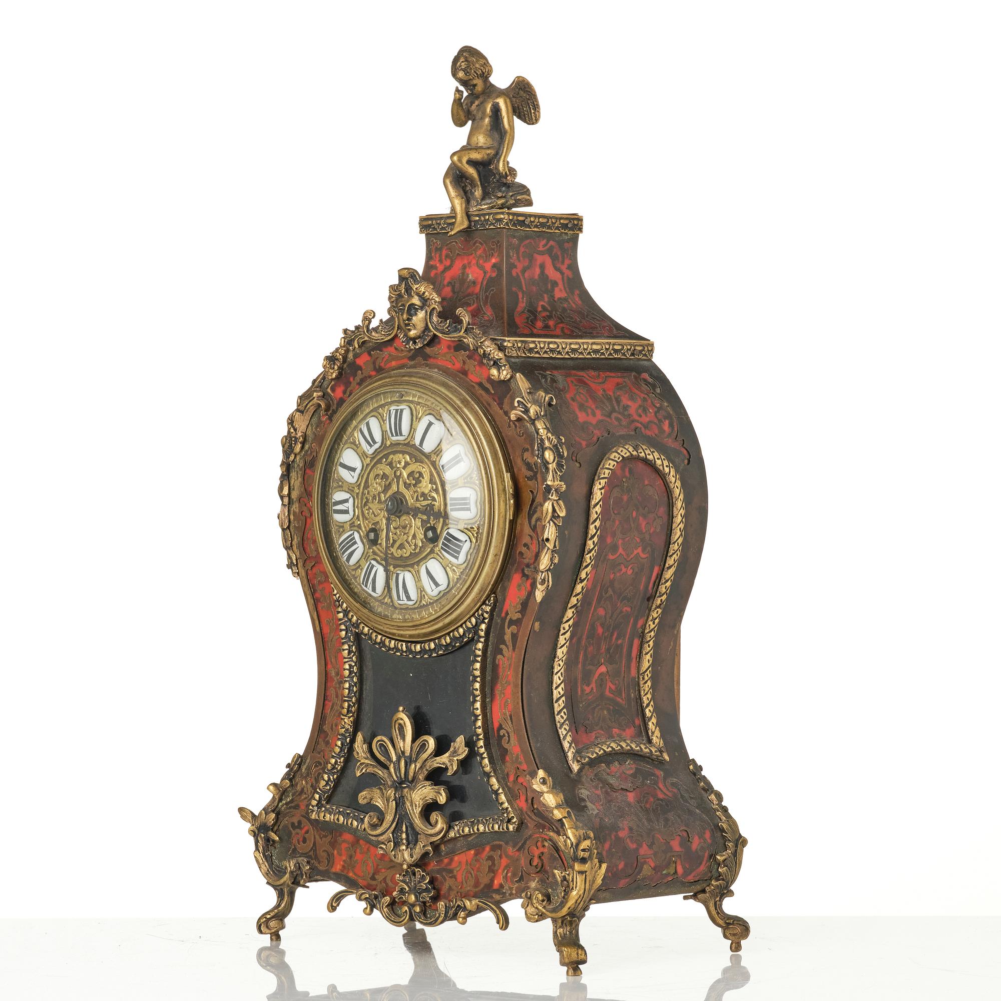 A Rococo-style mantle clock, around 1900.
