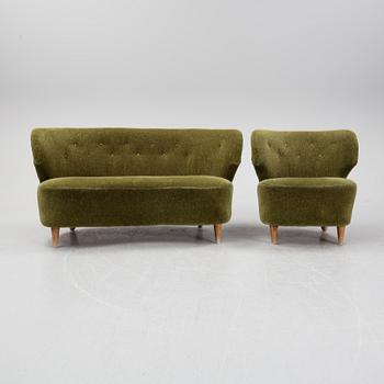 A sofa and easy chair, 1940s/50's.