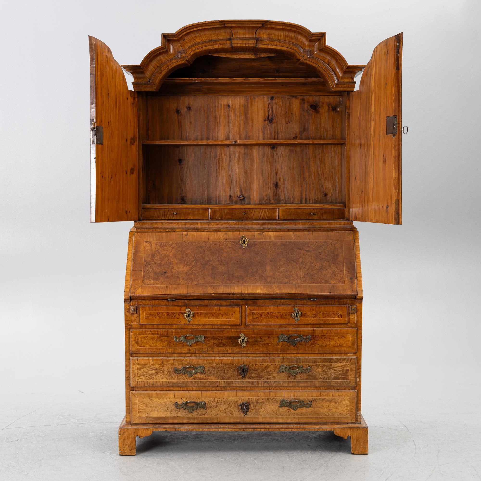 A Swedish rococo burr-alder veneered cabinet, later part 18th century.