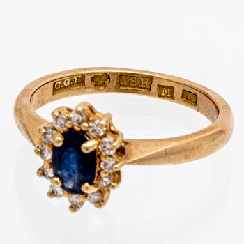 Ring 18K gold, 1 sapphire approx 6 x 4 mm, brilliant-cut diamonds approx 0,10 ct, size 54.