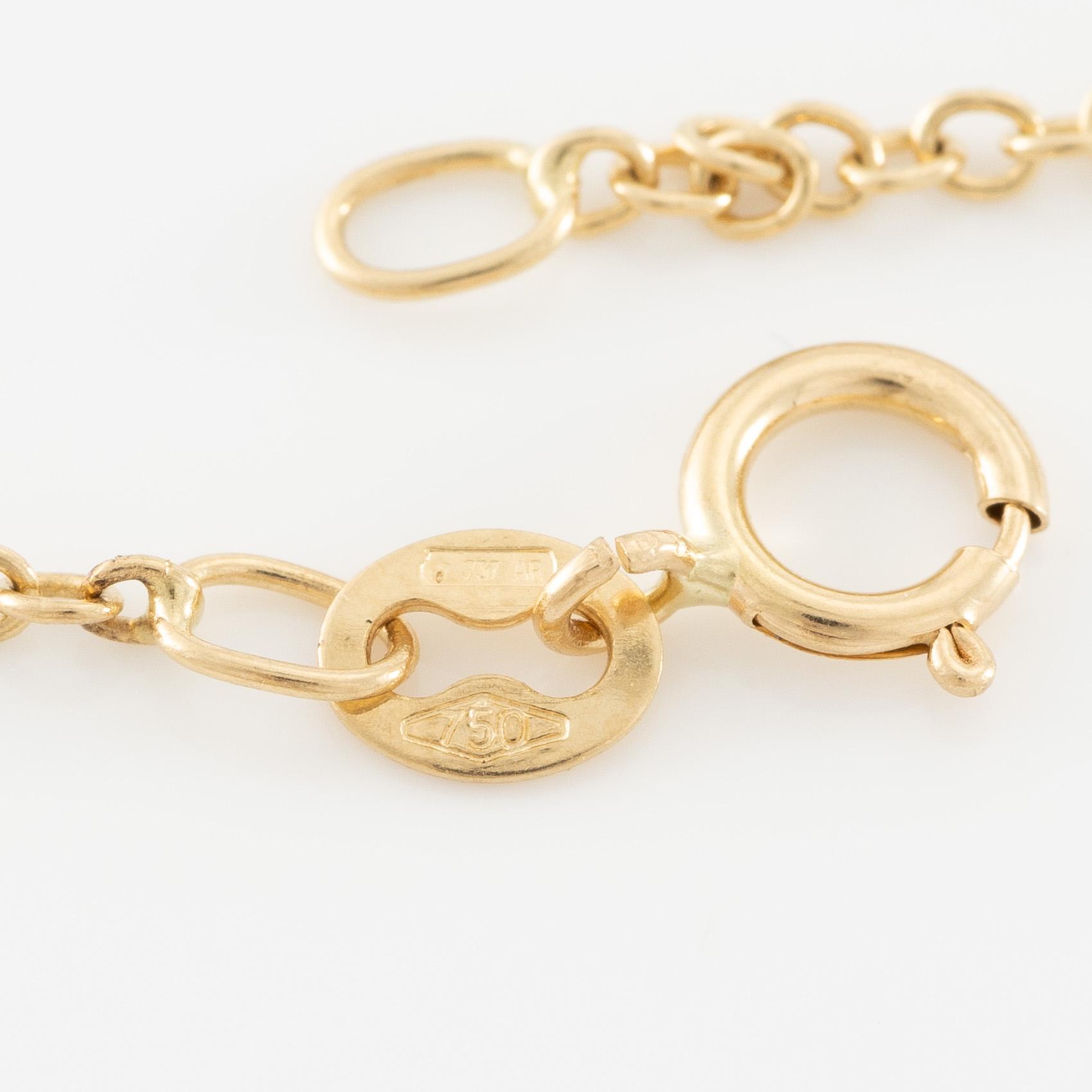 Necklace 18K gold with drop-shaped diamond.