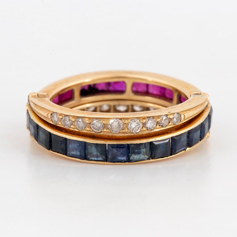 Calibre-cut ruby and sapphire and brillint-cut diamond ring.