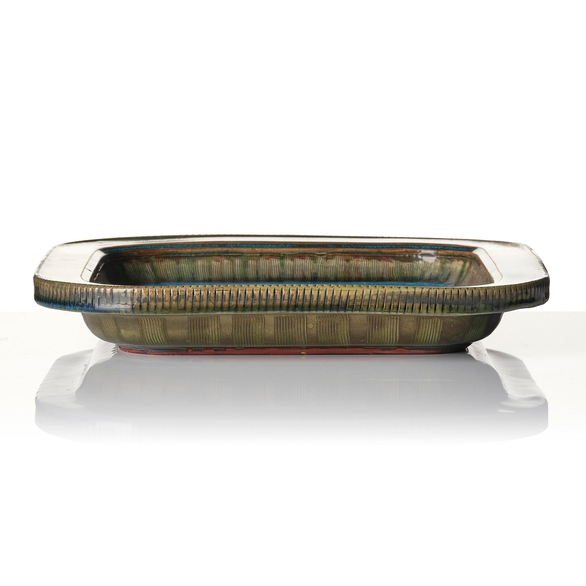 Wilhelm Kåge, a "Farsta" stoneware dish decorated with a face, Gustavsberg Studio, 1957.