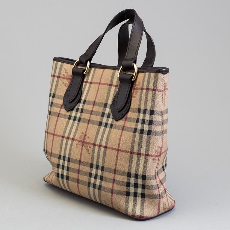 A nova-check bag by Burberry.