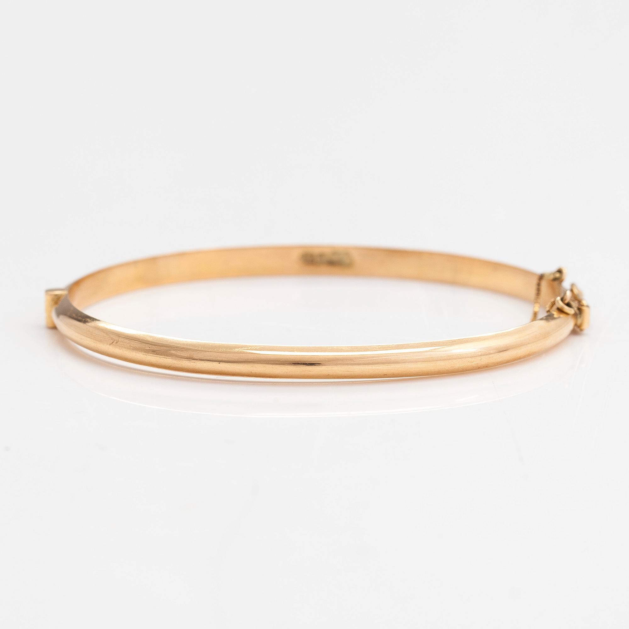 Armring, 14K guld, Ky Kari Rosti, Helsingfors 1994.