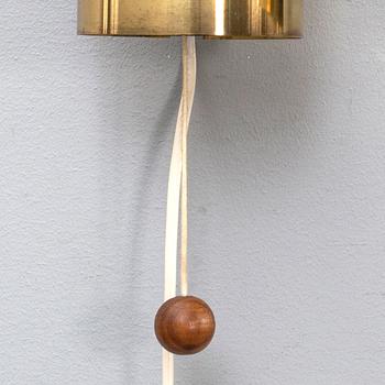 Wall lamps, a pair, brass, wood, probably Hans-Agne Jakobsson.