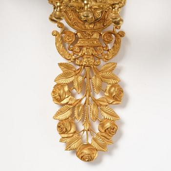 A pair of French 19th century gilt bronze five-light wall-lights.