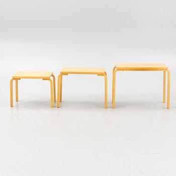 Alvar Aalto, a three-piece nesting table, modell 88, Artek, Finland, late 20th century.