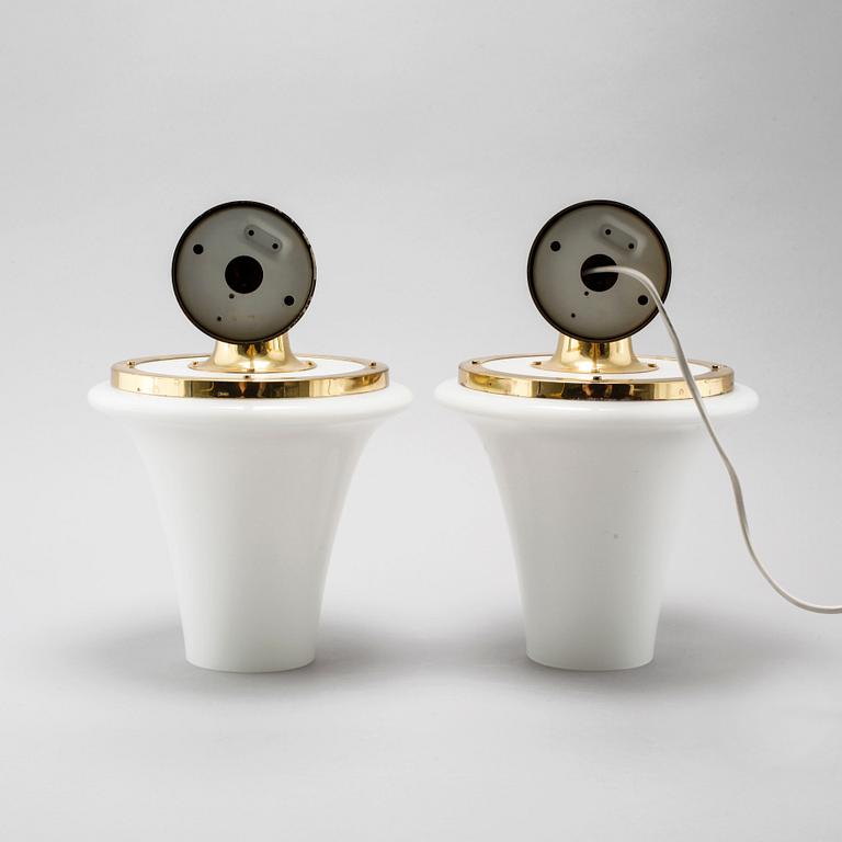 A pair of wall lamps designed by Hans-Agne Jakobsson, Markaryd, from the fourth quarter of the 20th century.