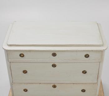 A chest of drawers, circa 1900.