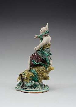 A famille verte figurine of a sea deamon, Qing dynasty, Kangxi (1662-1722).