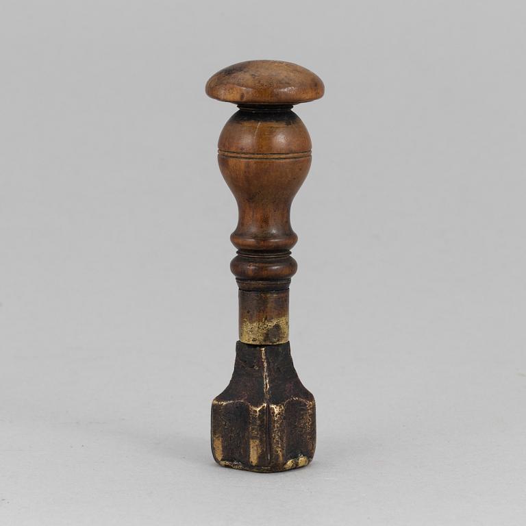 A 18th century glove makers seal.