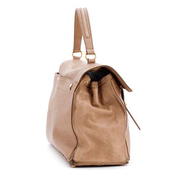 YVES SAINT LAURENT, a beige suede handbag, Muse Two".