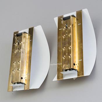 A pair of late 20th century brass wall lights for Ateljé Lyktan Åhus, Sweden.